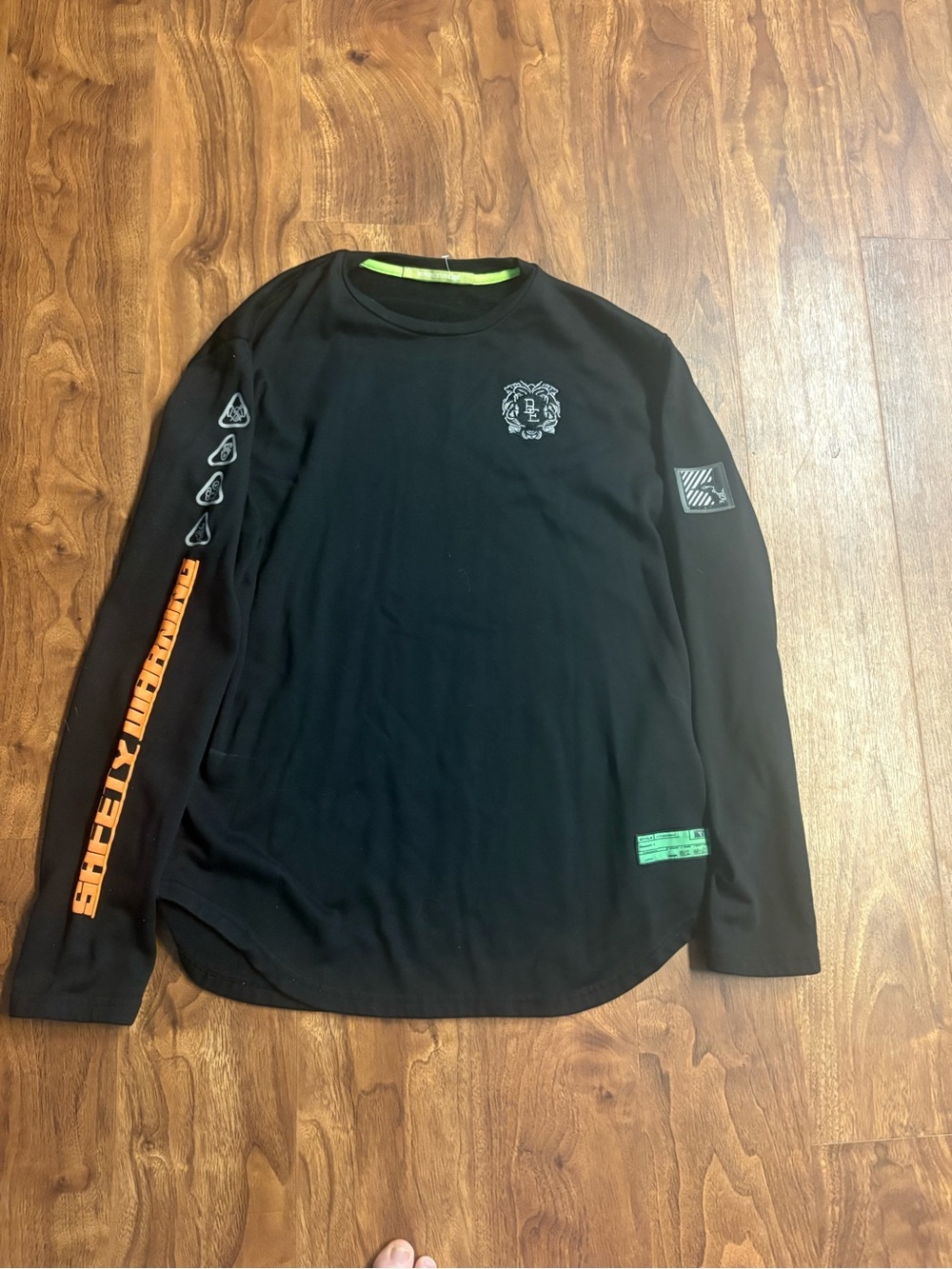 Men's Black Graphic Sweatshirt with Orange Eagle and Green 'Safety Warning' Text